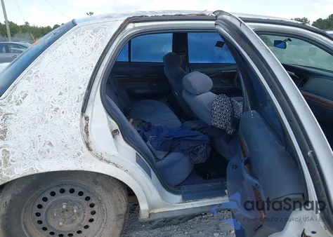 1999 Mercury Grand Marquis Gs z USA, uszkodzony, nr VIN 2MEFM74W7XX734151